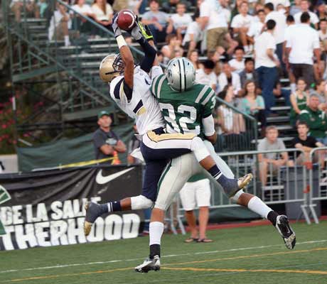 A great leaping grab by senior Michael Moore gave Mullen a 7-0 lead. De La Salle tied it on the ensuing kickoff. 