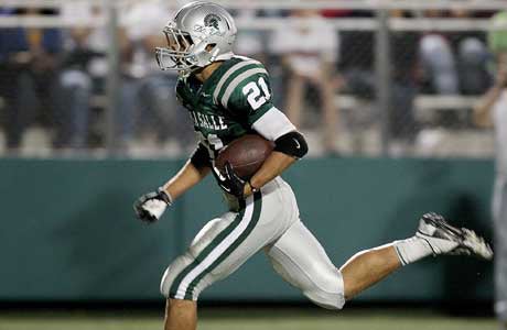 Junior running back Das Tautalatasi typified De La Salle's night. Here, his 35-yard touchdown run was nullified by penalty, but later he he scored on a 14-yard run to seal a 30-13 win. He finished with 75 rushing yards. 