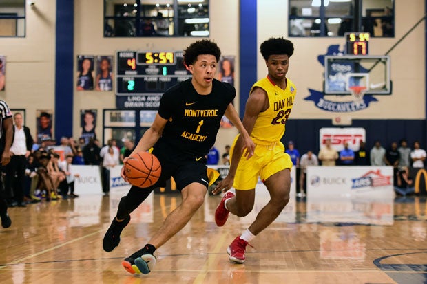 Montverde Academy's Cade Cunningham (1) blows past Darrick Jones Jr.