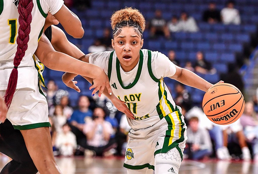 Kaleena Smith's junior campaign at Ontario Christian is one for the ages. Averaging 31.5 points per game, she led the Knights to state and national titles while sweeping state and national POY honors as well. (PHOTO: Louis Lopez)