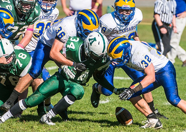 Abington (Mass.) and Kearsage (North Sutton, N.H.) players go after a loose ball.