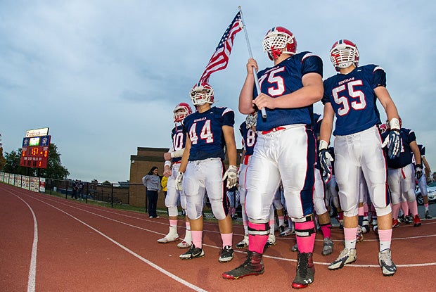 The MacArthur (Levittown, N.Y.) Generals prepare to take the field against Oceanside (N.Y.).