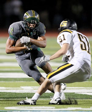 Marcus De La Pena leads San Ramon Valley
into Union City to face James Logan.