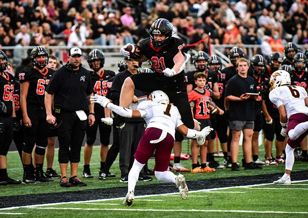 MaxPreps Kentucky Player of the Year Jacob Savage goes to the air in search of extra yardage during a September game against Cooper. (PHOTO: Brian Couch)