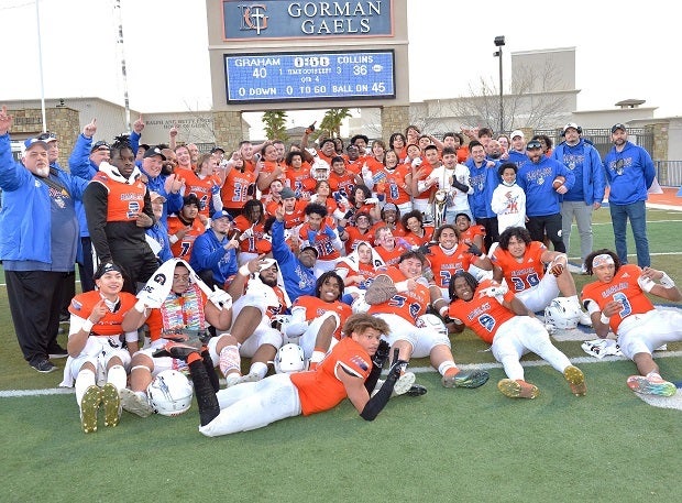 The Graham-Kapowsin coaches and players celebrate their thrilling 40-36 win Saturday over Collins Hill in the GEICO State Champions Bowl Series in Las Vegas.