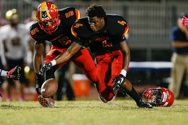 Jerry Jeudy lost his helmet on this play in a game against St. Thomas Aquinas in 2015 but kept his eye on the ball.