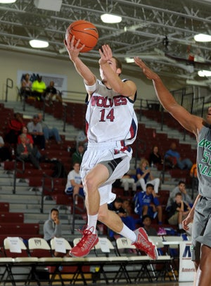 Ryan Lough goes up for a hanging layup Friday
in a MaxPreps Holiday Classic win over Green
Valley.
