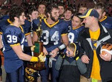 Kirtland celebrates a Div. V title.
