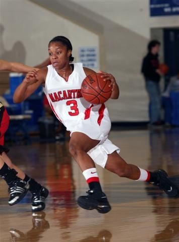 MacArthur's Odyssey Sims scored 25 points in second half.