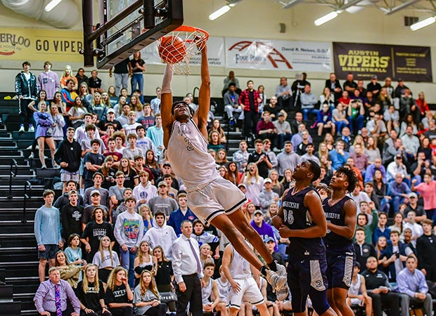 Greg Brown III of Vandegrift (Texas) caps a dunk against Hendrickson.