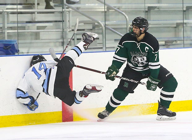 Dante Puleo of Ramapo (N.J.) lays  a hit on Mahwah's Nikolas Uva in the first round of the Bergen County Tournament.