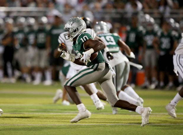 Arizona-bound Zeke Berry returned the opening kickoff 88 yards for a touchdown leading to a 24-0 first-half lead for De La Salle. 