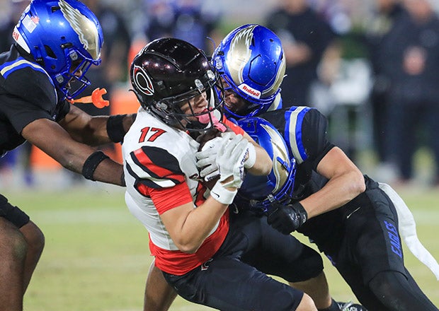 The Santa Margarita defense held Corona Centennial to seven points while sacking Huskies' quarterback Dominick Catalano six times. (PHOTO: Rene Morales)