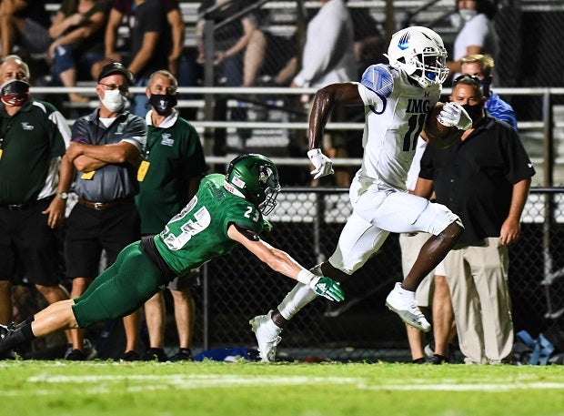 No. 1 IMG Academy raced to a season-opening victory with a 49-13 win over Venice (Fla.) on Friday.