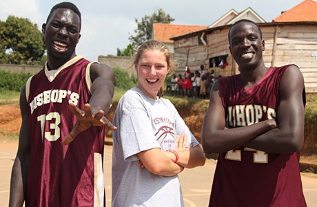 Devon Roeper (center), a standout basketball player at Bishop's in San Diego, helped organize an effort to use basketball to stabilize a dilapidated area of Uganda.