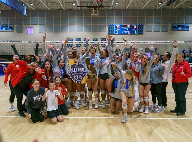 The Mater Dei coaches and players celebrate the Open Division crown, the second in three season. (PHOTO: Diane Torrence)