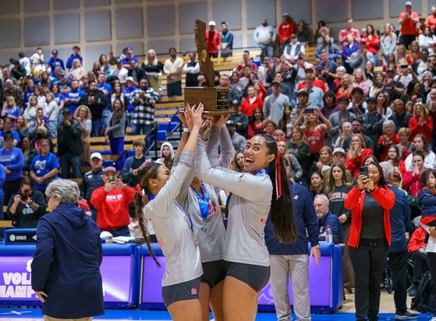 Mater Dei's Sam Capinpin and Westley Matavao celebrate winning the CIF Open Division state title on Saturday at Santiago Canyon College. It was the third overall Open title for the No. 3 Monarchs and the second in three seasons. (PHOTO: Diane Torrence)