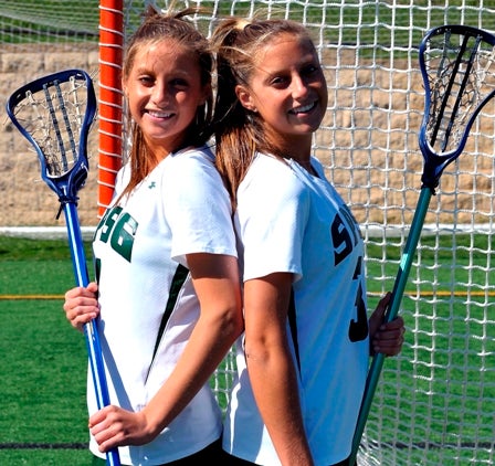 It might require a double-take to determine which of the Boyd twins are which. Kelly (left) and Brooke, both headed to the University of Virginia, are leading the St. Paul's Girls squad this season with twin connections.