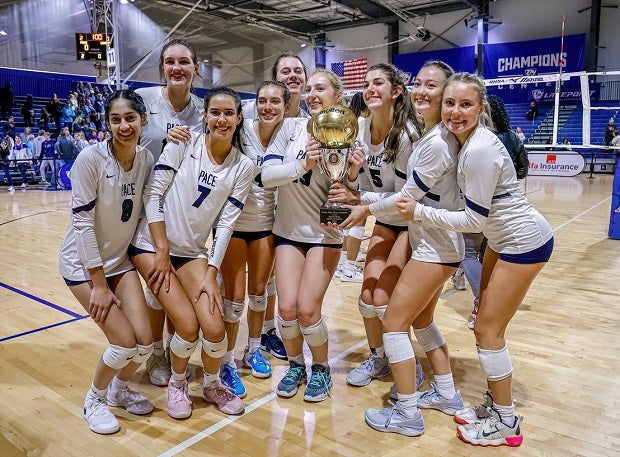 Some Pace Academy players pose with the Georgia AAAA trophy after the Knights beat Lovett for the title. It was the seventh straight championship for Pace. (Photo: Cecil Copeland)