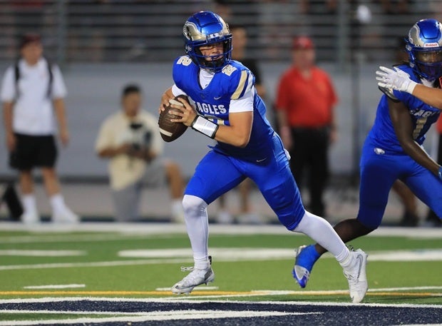 Trace Johnson threw two touchdown passes Thursday night to help his Heisman Trophy-winning head coach Carson Palmer notch his first victory. (FILE PHOTO: Rene Morales)
