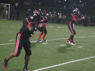 Scarlet Fliers improve to 1-1