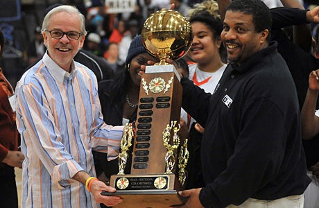 McClymonds coach Dennis Flannery during his team's one shinning moment following historic Oakland Section championship.