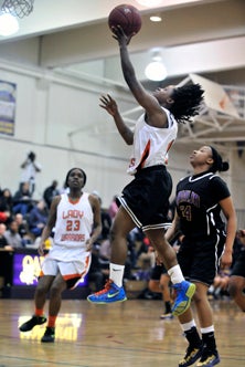 Gabby Gaines is only 4-foot-11, but
she's fearless to the basket.