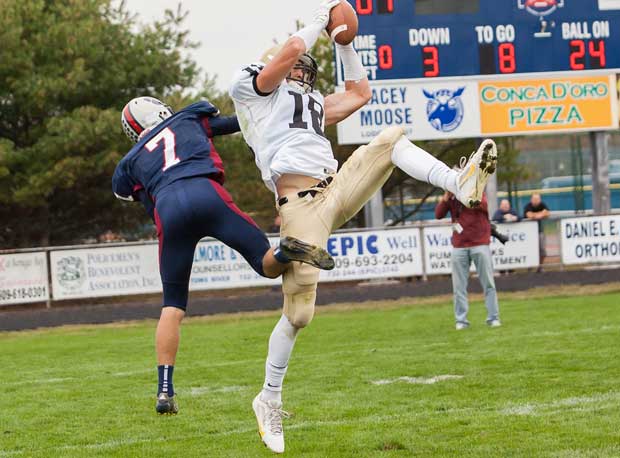 Mike Gesicki of Southern Regional (Manahawkin, N.J.) makes a leaping grab as a Lacey Township (Lanoka Harbor, N.J.) player tries to stop the completion.