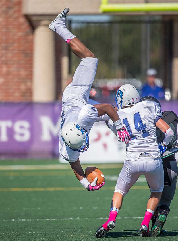 A Brazoswood (Texas) ballcarrier gets upended against Clear Falls (League City, Texas).