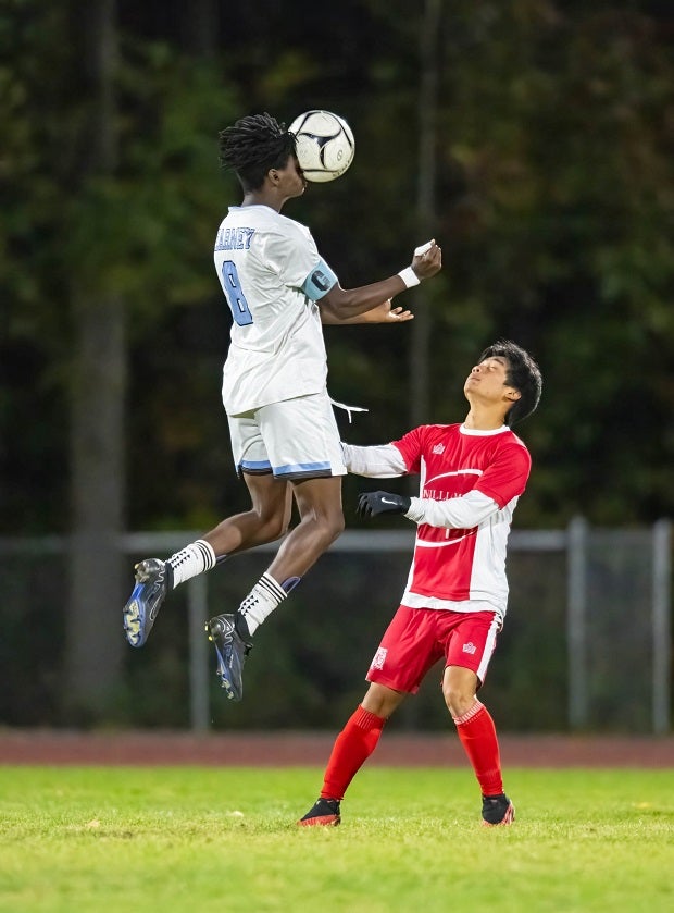 Bishop Kearney's Josh Baraka keeps his eye on the ball in a match against Williamson.(Photo: Dennis Joyce)