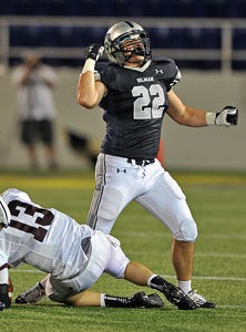 Gilman's Nick Feritta celebrates a sack.