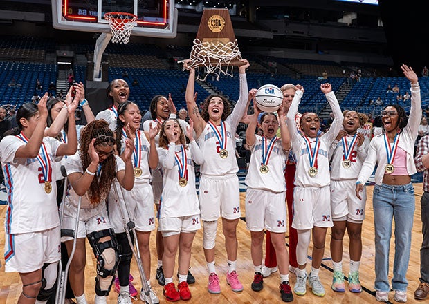Record-setting Texas basketball star Aaliyah Chavez (center, holding trophy) celebrates with her Monterey teammates after winning a state title. Chavez, the MaxPreps National Player of the Year, will continue her career next season at Oklahoma. (PHOTO: Alex Garza)