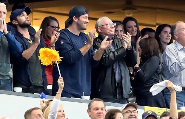 Dallas Cowboys owner Jerry Jones along with quarterback Tony Romo watch Jones' grandson play in the UIL 5A Division I state championship game on Saturday afternoon at AT&T Stadium. 