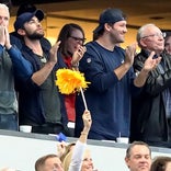 Jerry Jones, Tony Romo watch HS team win