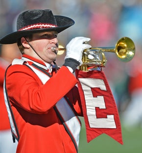 An Easton band member performs during the half
time of the game.