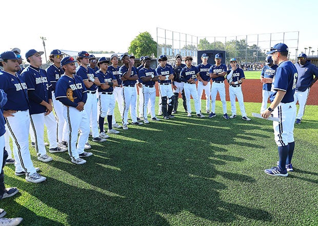 St. John Bosco coach Andy Rojo talks to his team after a win over JSerra Catholic in April. The Braves climbed to No. 3 in this week's rankings after emerging as the victor in California's powerhouse Southern Section Division 1 bracket. (PHOTO: Nick Koza)
