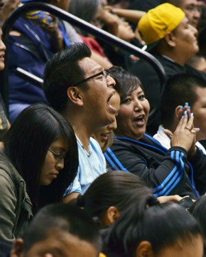 Basketball games are a chance for fans to let looseand have fun, and fans seize the opportunity at RezBall games.
