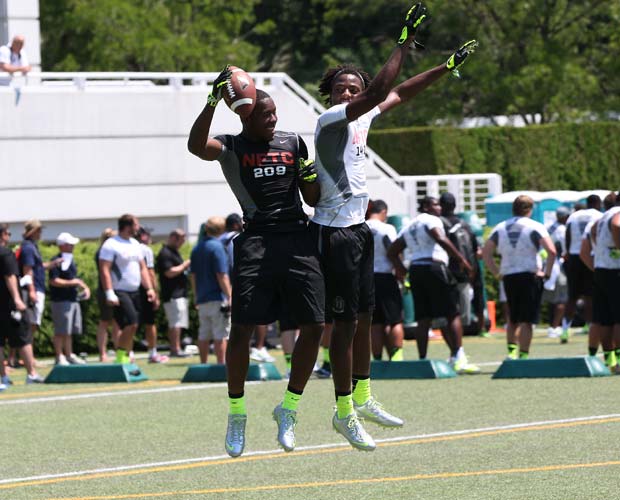 Cornerback Kevin Alexander (left), of North Little Rock (Ark.), celebrates with Michiah Quick, of Fresno Central (Calif.), after making a play during training camp.
