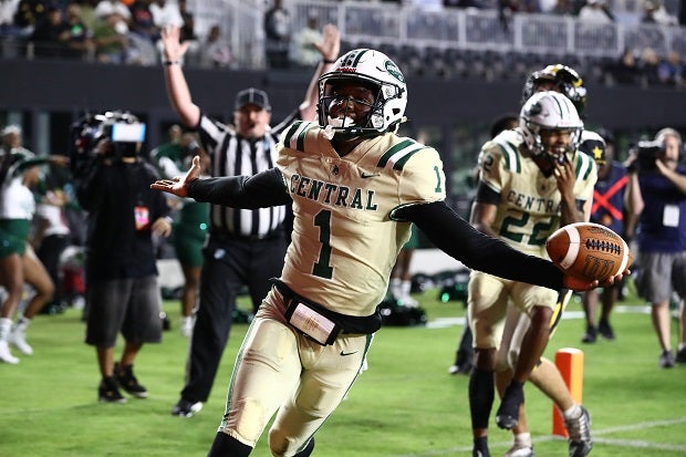 No. 3 Miami Central quarterback scores a rushing touchdown in the second quarter of the Rockets' win over No.10 American Heritage in the Florida 3M finals. Jenkins also tossed three TD passes in the first half. (Photo: Laura Martin)