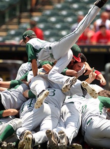 The Woodlands enjoyed quit a dogpile
after winning its third state title
since 2000.
