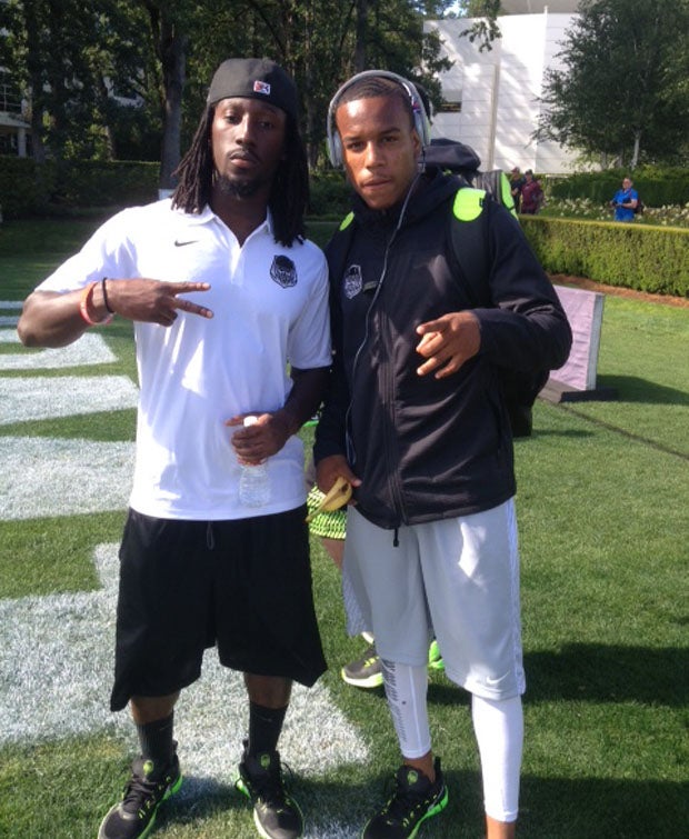 Desmond Trufant, of the Atlanta Falcons (left) and Iman Marshall, of Long Beach Poly.  
