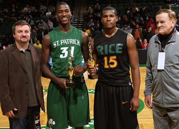 St. Patrick forward Michael Gilchrist (No. 31, left) and Jermaine Sanders of Rice were honored after a 74-58 Celtic win.