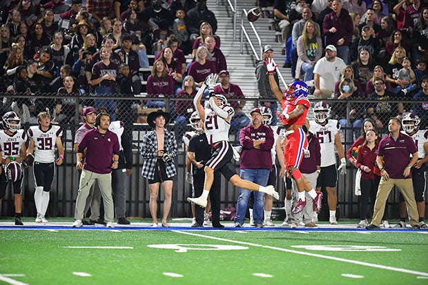 Ty Walls of Jenks hauls in a catch during the first half of a historic upset of Bixby on Thursday night. (Photo: Jim Weber)