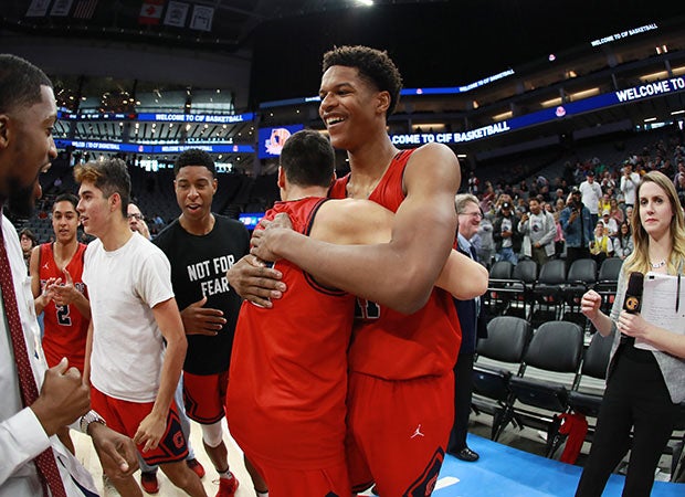 Shareef O'Neal celebrates a CIF State Division 1 championship after a 59-53 win over Alameda at Golden 1 Center in Sacramento. 