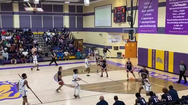 Basketball Recap: Malone Skates Past Vernon with Ease