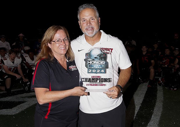 Pictured here after leading his team to a win over Liberty of Nevada in the Honor Bowl last September, Centennial head coach Matt Logan is expected to join elite company sometime this fall when he gets his 300th win. (PHOTO: Michael Cazares)