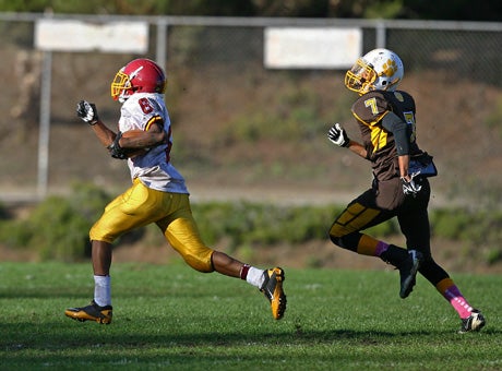 Demetrius Williams is now running away from defensive backs rather than the law. The Lincoln senior leads the Mustangs into the 89th Turkey Day Game this morning at Kezar Stadium. 