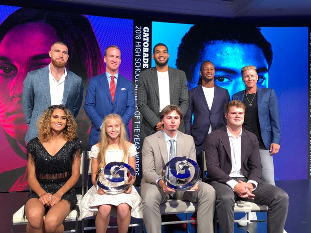 Female and male winners Katelyn Tuohy and JT Daniels (center bottom row) are surrounded by Gatorade presenters. Top row (L-R): Travis Kelce, Peyton Manning, Karl-Anthony Towns, Todd Gurley and Abby Wambach. Bottom row (L-R): Sydney McLaughlin, Tuohy, Daniels and Sam Darnold. 