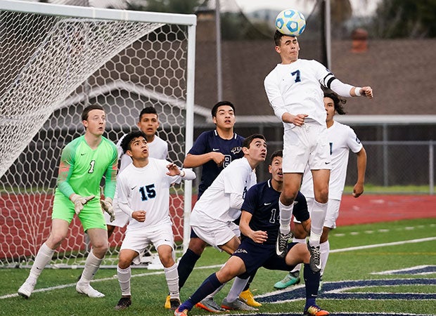 Akia Ramirez of Pleasant Valley (Calif.) intercepts a corner kick with a header against host Ygnacio Valley in a CIF NorCal Regional Division 4 semifinal game.