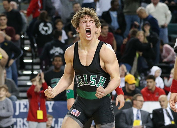 Lucas Revano of Camden Catholic (N.J.) celebrates his win in the 145-pound weight class in the NJSIAA State Wrestling Championships